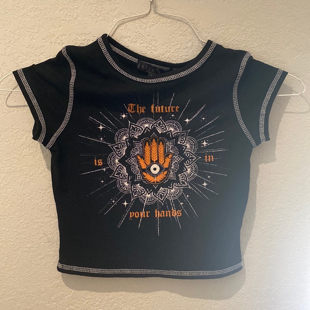 Never been worn baby doll tee!!! Size M.